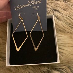 Gold earrings never worn.